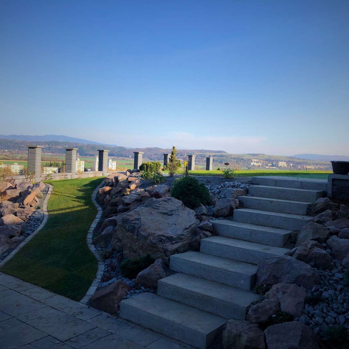 Completed rock garden in the garden - aesthetically arranged stones, planting of rockeries and ornamental plants from Dream Garden