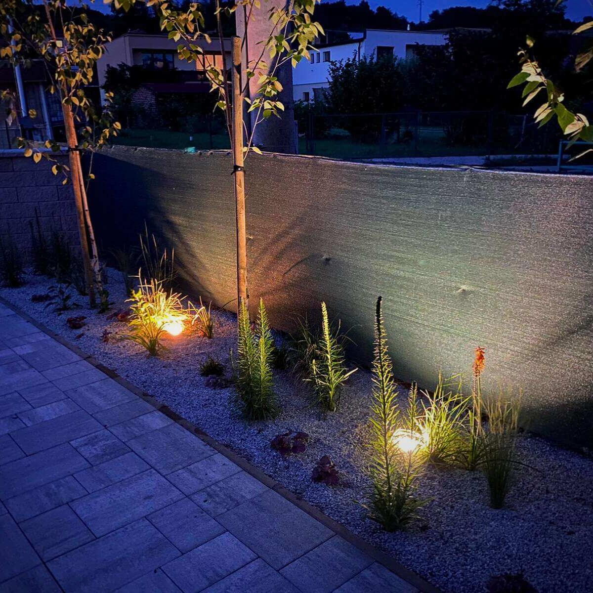 Planting lighting in a modern garden from Dream Garden - designer LED lights integrated among ornamental plants