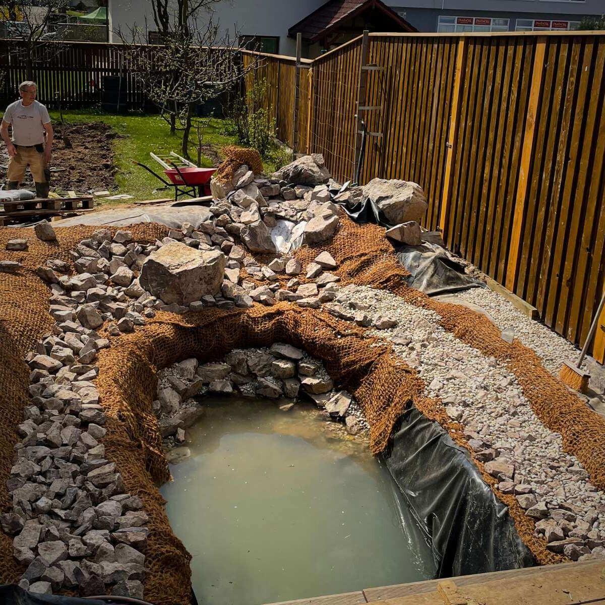 Garden pond filling with stones from Dream Garden
