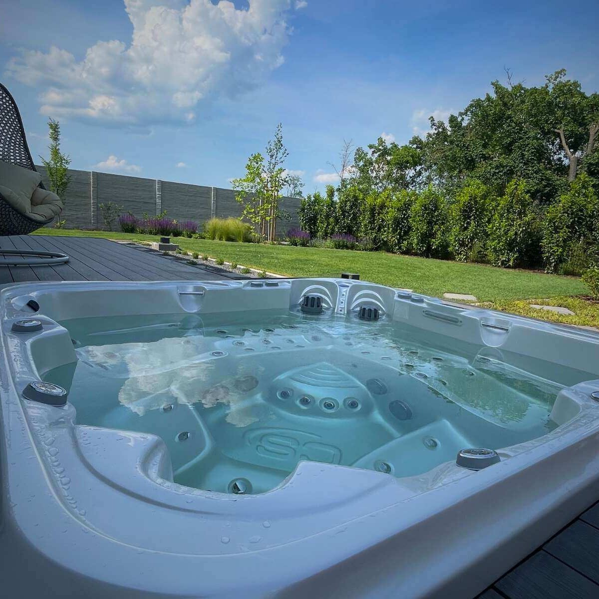 Modern hot tub from Sanika Group on the terrace - a luxurious wellness element for year-round relaxation and economical operation
