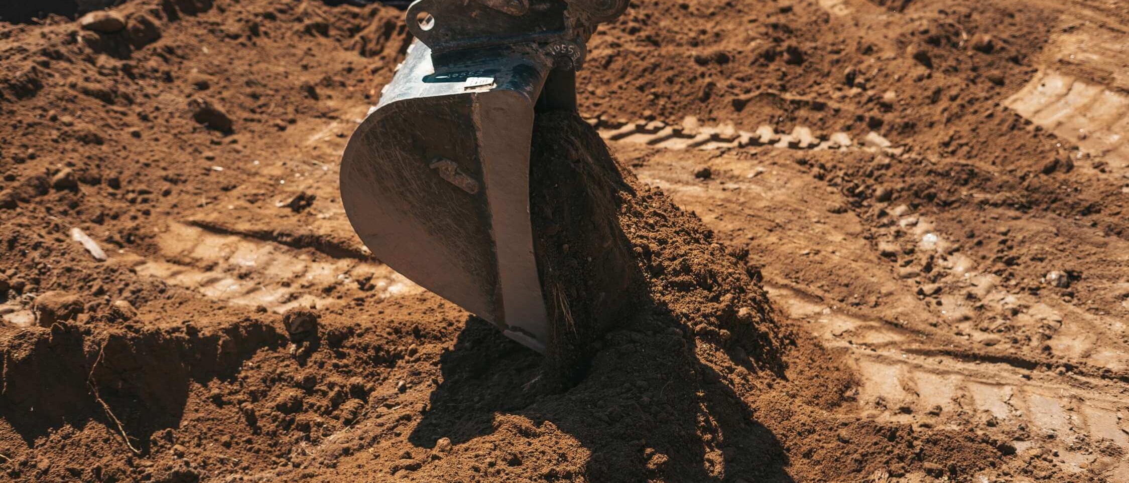 Excavation work in preparation of the exterior or garden using construction equipment