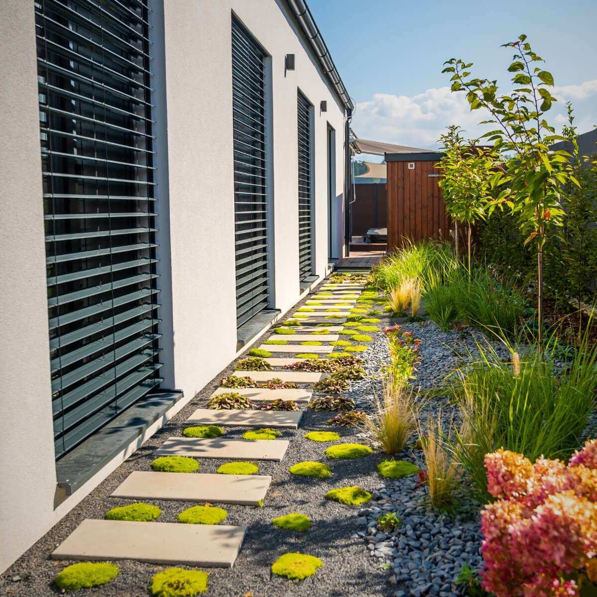 Modern garden by Dream Garden - a combination of garden paving and aesthetically landscaped beds with planting
