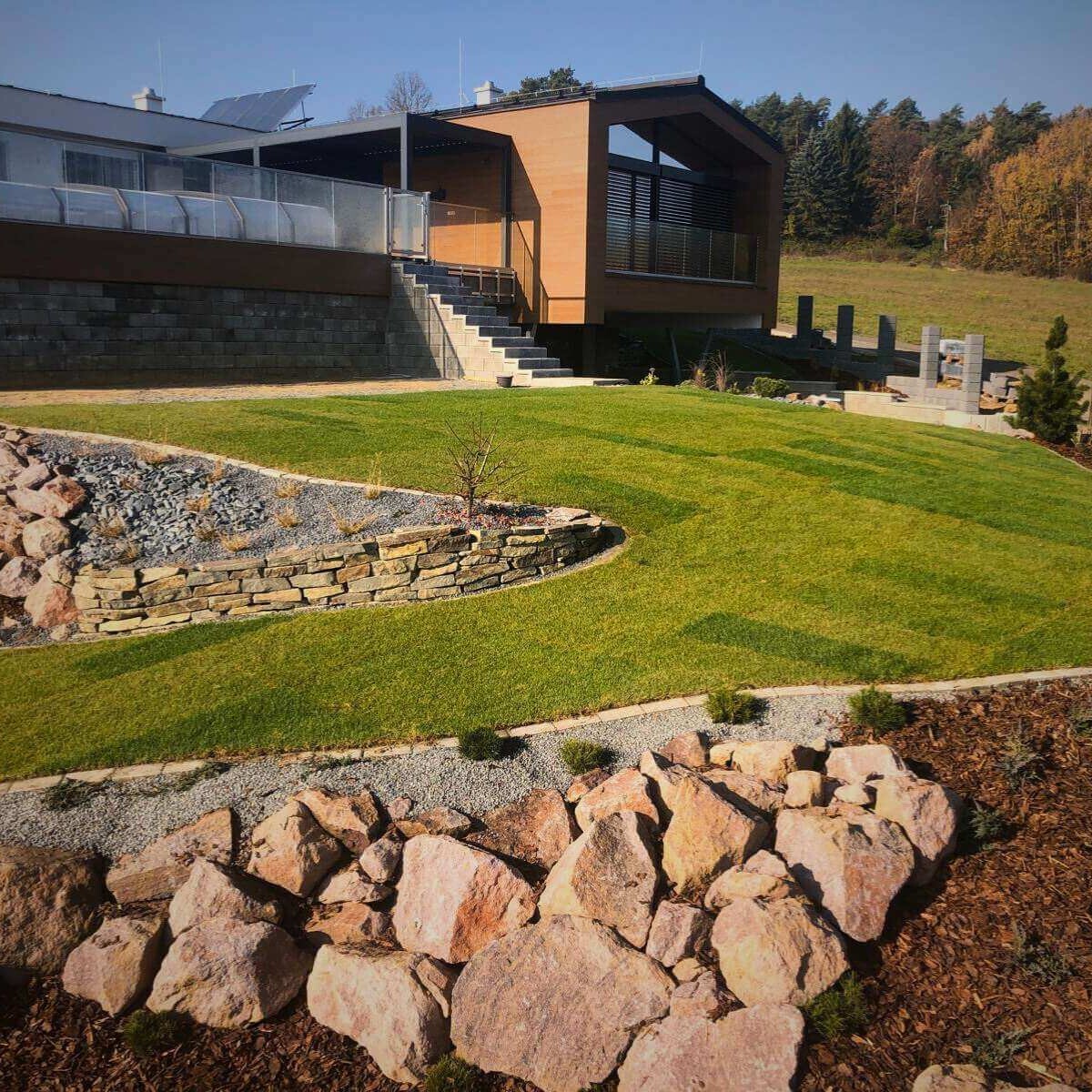 Complete garden implementation by Dream Garden - landscaping, planting plants, installation of an irrigation system and lighting for a harmonious exterior
