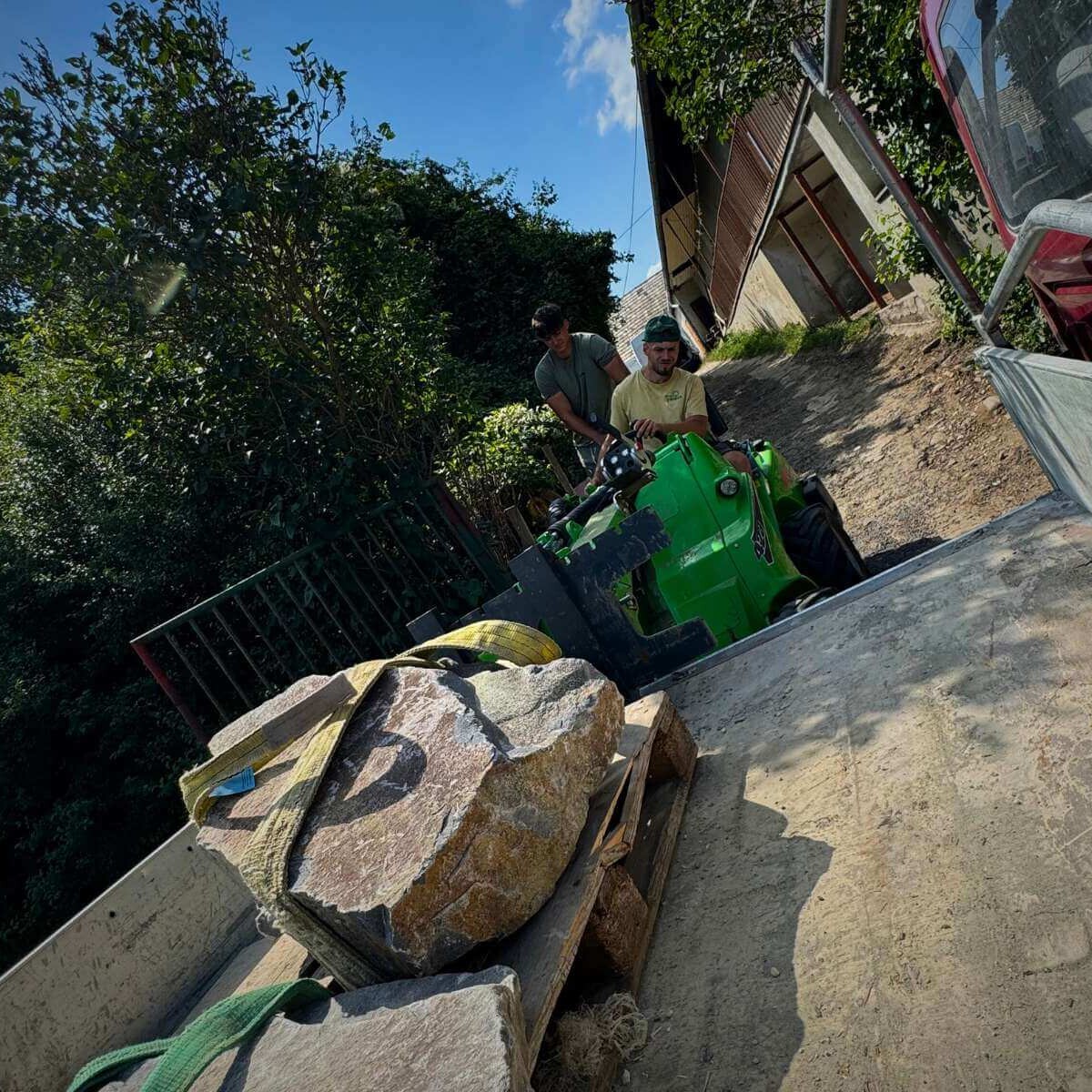 Importing stone to the garden from Dream Garden - a truck brings ornamental stone for the implementation of garden elements