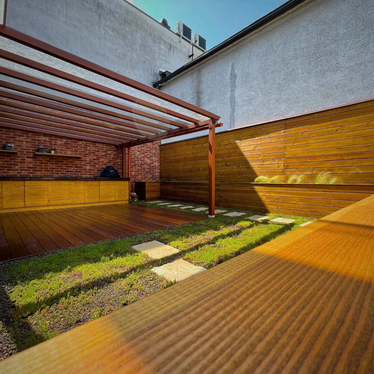 Outdoor terrace in Žilina by Dream Garden - modern outdoor space with kitchen, covered roof and raised beds for comfortable dining